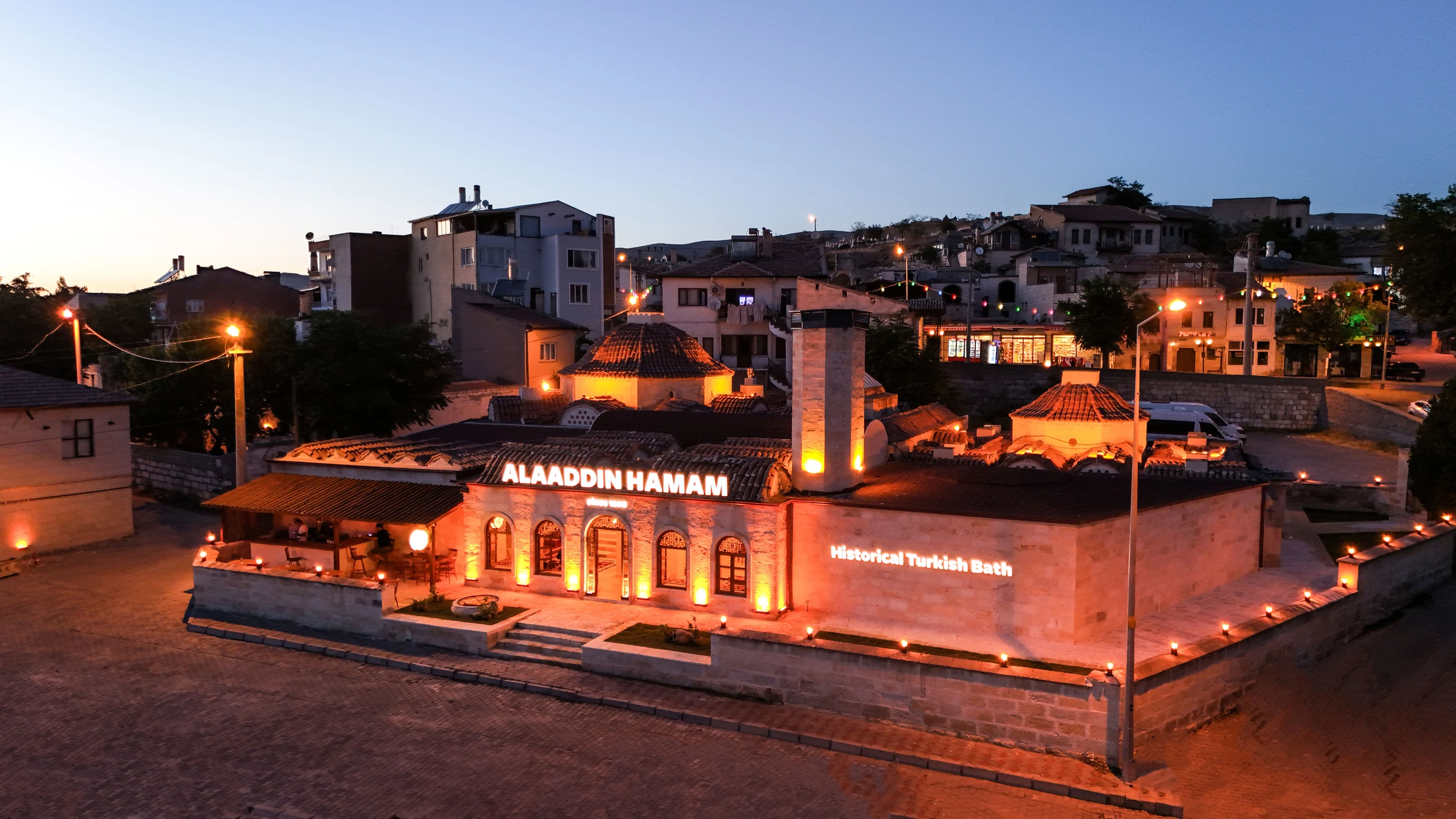Alaaddin Hamam illuminated in Avanos after sunset