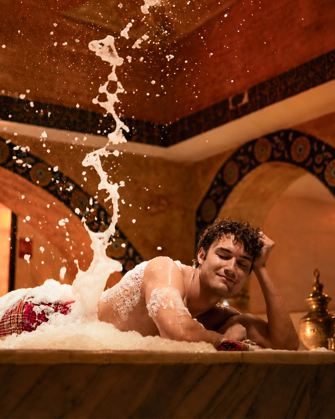 A guest enjoying the traditional foam ritual